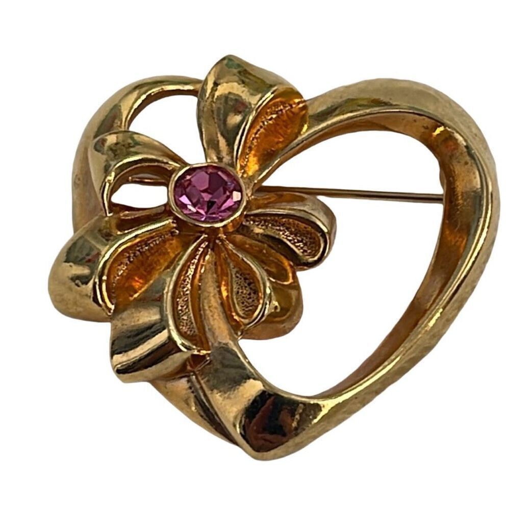 Vintage Avon gold colored bow &heart brooch pink stone
